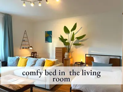 Ein Bett oder Betten in einem Zimmer der Unterkunft Parterre Lounge mit Terrasse -Nähe Karlsruhe & KIT - ohne Treppen -barrierefreie Dusche