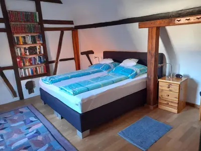 Ein Bett oder Betten in einem Zimmer der Unterkunft Ferienhaus Pfalzklause