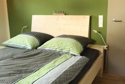 Ein Bett oder Betten in einem Zimmer der Unterkunft Ferienwohnung Kuschelecke