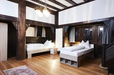 Ein Bett oder Betten in einem Zimmer der Unterkunft Gentilburg und Gärtnerhaus Aschaffenburg