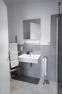 Ein Badezimmer in der Unterkunft Prime Park Family Deluxe Apartment Aschaffenburg