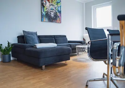 Ein Sitzbereich in der Unterkunft Prime Park Family Deluxe Apartment Aschaffenburg