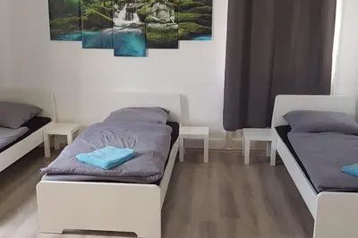 Ein Bett oder Betten in einem Zimmer der Unterkunft Monteurwohnung - Vaihingen