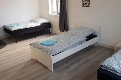 Ein Bett oder Betten in einem Zimmer der Unterkunft Monteurwohnung - Vaihingen