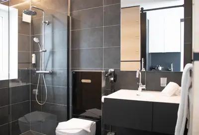 Ein Badezimmer in der Unterkunft RNK Hotel by WMM Hotels