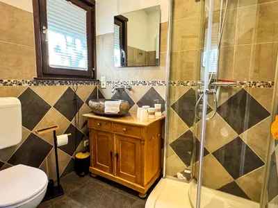 Ein Badezimmer in der Unterkunft Räuberlager 15