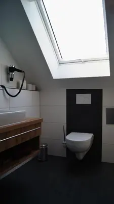 Ein Badezimmer in der Unterkunft Gästehaus Winzerhof am Schlierbach