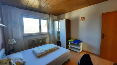 Ein Bett oder Betten in einem Zimmer der Unterkunft Gemütliche, helle Wohnung im Luftkurort Dansenberg