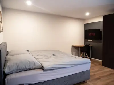 Ein Bett oder Betten in einem Zimmer der Unterkunft Pension HSL