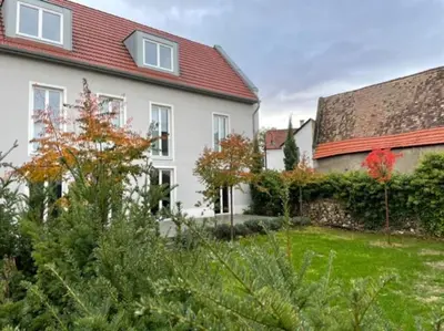 Ein Garten an der Unterkunft Wohnen am Seebach