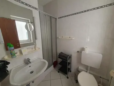 Ein Badezimmer in der Unterkunft App 25 Gästehaus Zwingenberg