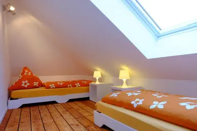 Ein Bett oder Betten in einem Zimmer der Unterkunft heidel-home 2Raum Studio