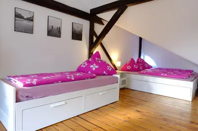 Ein Bett oder Betten in einem Zimmer der Unterkunft heidel-home 1Raum Studio