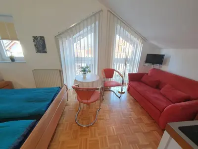 Ein Sitzbereich in der Unterkunft App 31 Gästehaus Zwingenberg