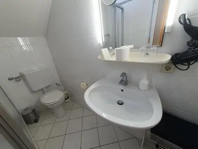 Ein Badezimmer in der Unterkunft App 31 Gästehaus Zwingenberg