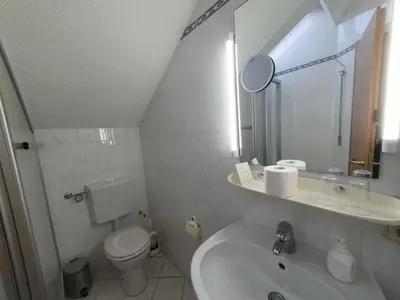 Ein Badezimmer in der Unterkunft App 31 Gästehaus Zwingenberg