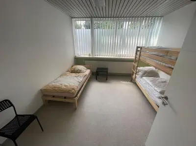 Ein Bett oder Betten in einem Zimmer der Unterkunft Monteursparadies 4 DZ, 2 Bäder, einfach gut