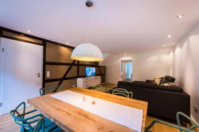 Ein Bett oder Betten in einem Zimmer der Unterkunft GASTHAUS Porzelt Wohnung 3