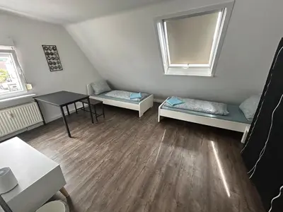 Ein Bett oder Betten in einem Zimmer der Unterkunft Monteurwohnung mit Parkplatz - Besigheim