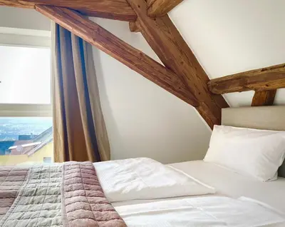 Ein Bett oder Betten in einem Zimmer der Unterkunft Schönster Blick auf Oppenheim!