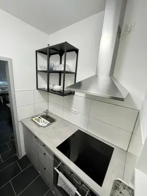 Küche/Küchenzeile in der Unterkunft Urbanes Apartment Nähe ECE - Center & Schloss