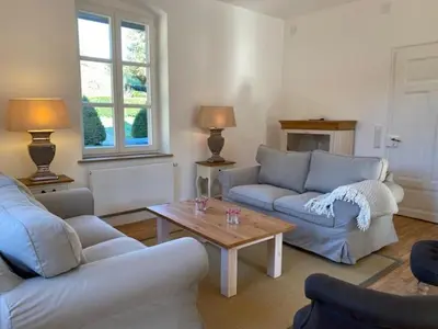 Ein Sitzbereich in der Unterkunft Charmantes Gästehaus Maya im Schloß und Hofgut Langenzell