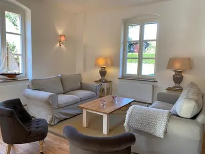 Ein Sitzbereich in der Unterkunft Charmantes Gästehaus Maya im Schloß und Hofgut Langenzell