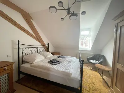 Ein Bett oder Betten in einem Zimmer der Unterkunft Haardter Mandelring