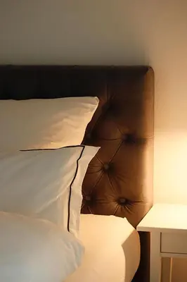 Ein Bett oder Betten in einem Zimmer der Unterkunft Land.Wein.Gut Pension