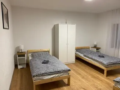 Ein Bett oder Betten in einem Zimmer der Unterkunft Ferienwohnung Schwabenheim an der Selz
