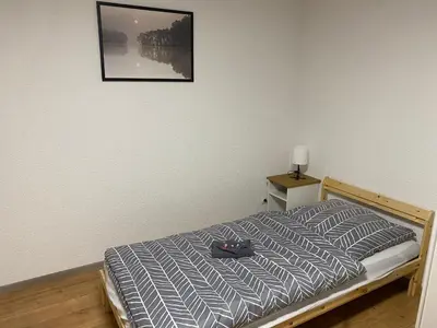 Ein Bett oder Betten in einem Zimmer der Unterkunft Ferienwohnung Schwabenheim an der Selz