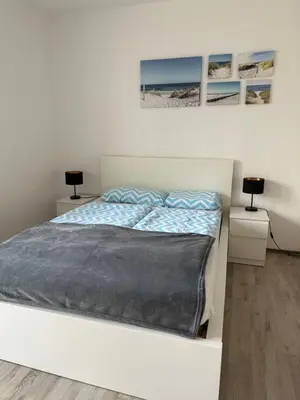 Ein Bett oder Betten in einem Zimmer der Unterkunft Living Lu - cosy Apartment two - Netflix - nähe Mannheim - BASF - 2 Zimmer