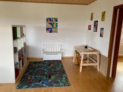 Ein Bett oder Betten in einem Zimmer der Unterkunft Ferienwohnung Gemütliches Eck