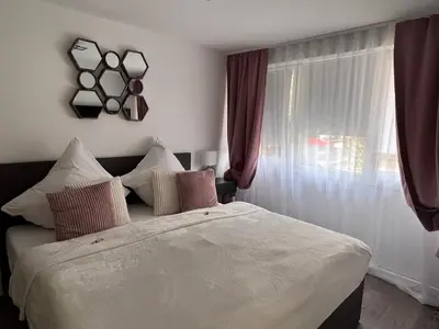 Ein Bett oder Betten in einem Zimmer der Unterkunft Prime Host Dream