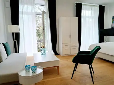 Ein Bett oder Betten in einem Zimmer der Unterkunft Stadtpalais am Schöntal