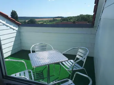 Ein Balkon oder eine Terrasse in der Unterkunft NEU Ferienwohnung Odenwald