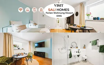 Ein Bett oder Betten in einem Zimmer der Unterkunft 1BR 2Beds - kleiner privater Innenhof- Barrierefrei! -frisch saniert - Mozart EINS