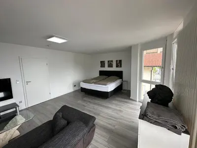 Ein Bett oder Betten in einem Zimmer der Unterkunft Deluxe Appartement