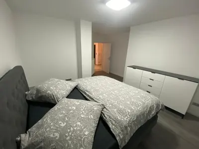 Ein Bett oder Betten in einem Zimmer der Unterkunft Deluxe Appartement