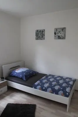 Ein Bett oder Betten in einem Zimmer der Unterkunft Gästewohnung Pakulies