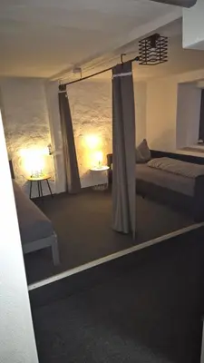Ein Bett oder Betten in einem Zimmer der Unterkunft Fridolin
