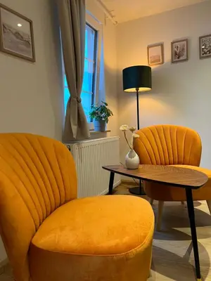Ein Sitzbereich in der Unterkunft Apartmenthaus Wagner