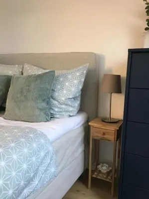 Ein Bett oder Betten in einem Zimmer der Unterkunft Gemütliches Apartment am Kurhaus in Dobel