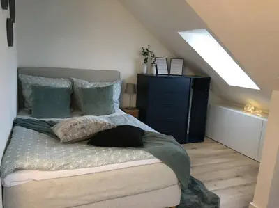 Ein Bett oder Betten in einem Zimmer der Unterkunft Gemütliches Apartment am Kurhaus in Dobel