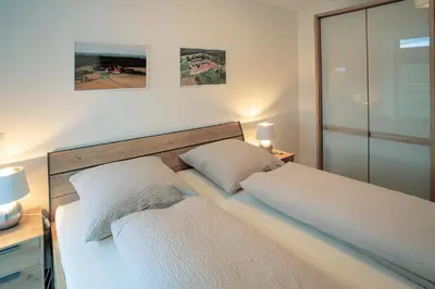 Ein Bett oder Betten in einem Zimmer der Unterkunft Ferienwohnungen - Gutshof Dürrhof