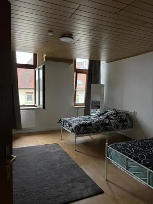 Ein Bett oder Betten in einem Zimmer der Unterkunft 1 Zimmer für 2 Personen Bruchsal ruhige Lage (Monteurzimmer)