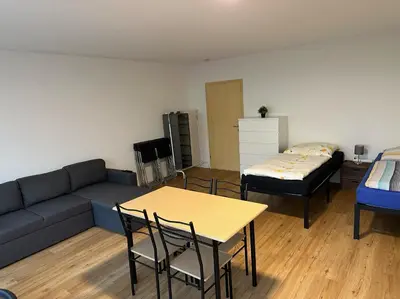 Ein Bett oder Betten in einem Zimmer der Unterkunft Beautiful, large and great apartment with balcony in top location