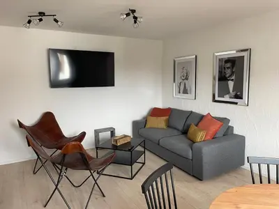 Ein Sitzbereich in der Unterkunft Freigeist Apartments