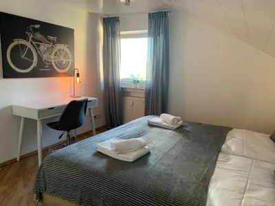 Ein Bett oder Betten in einem Zimmer der Unterkunft 2 Zimmer Ferienwohnung