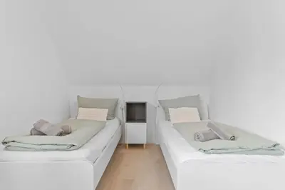 Ein Bett oder Betten in einem Zimmer der Unterkunft II. Perouser Wohlfühloase